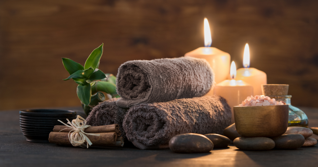 candles and towels in spa setting
