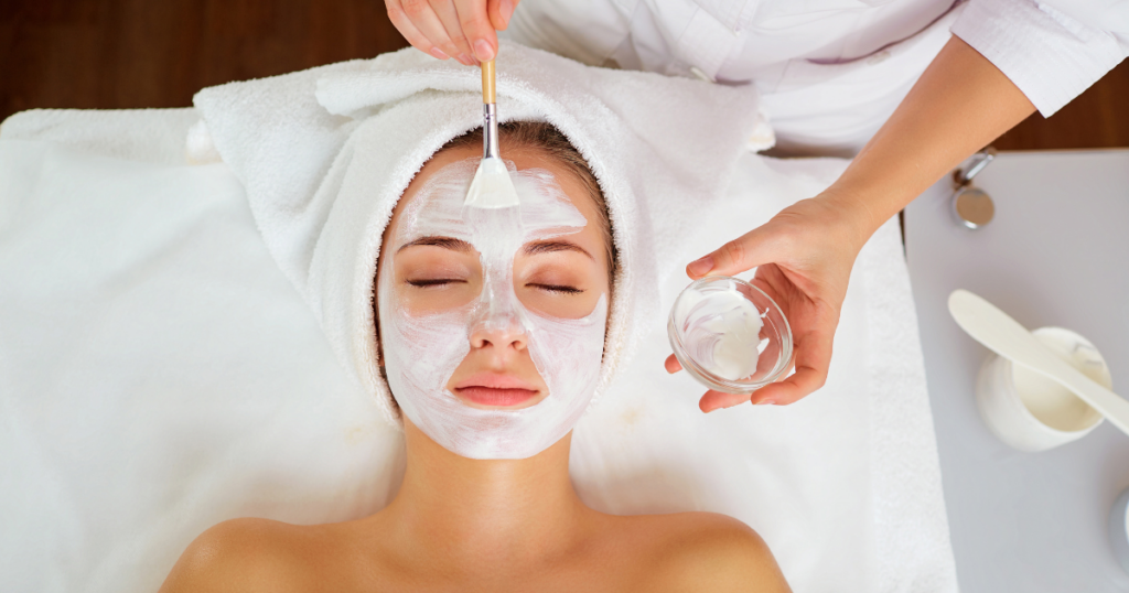woman receiving facial