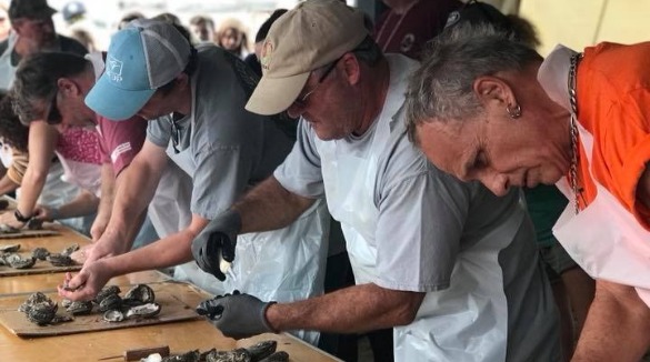 Oyster shucking contest at the NC Oyster Festival | Williamson Realty Ocean Isle Beach Vacation Rentals