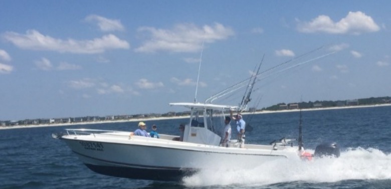 fishing boat in the water | Williamson Realty