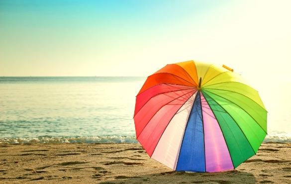 beach umbrella on the beach | Williamson Realty