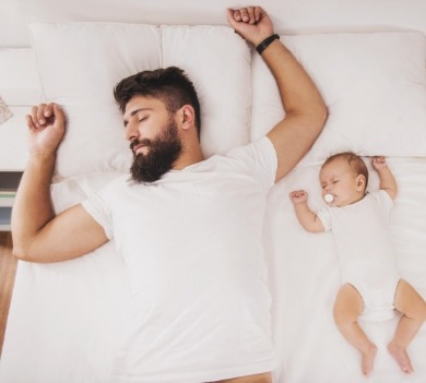 father and child sleeping | Williamson Realty