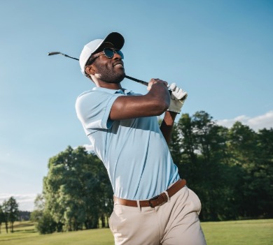 father playing golf | Williamson Realty