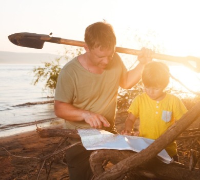 father and son participating in scavenger hunt | Williamson Realty