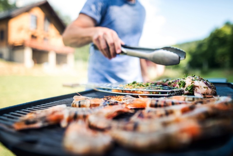 seafood cooking on a grill | Williamson Realty