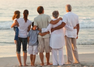 family on the beach | Williamson Realty
