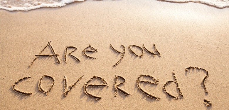 are you covered written in the sand on the beach | Williamson Realty