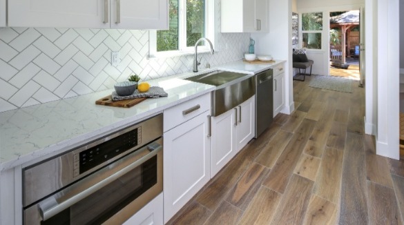 clean white tiled kitchen | Williamson Realty
