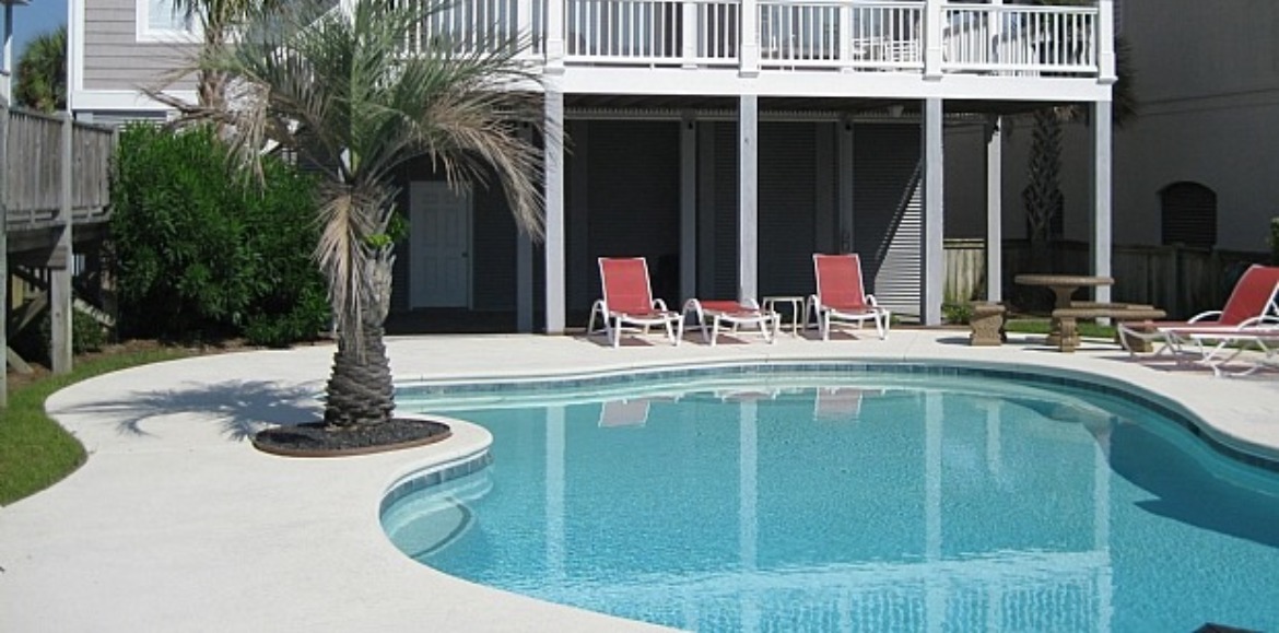 swimming pool at Ocean Isle West Boulevard 147 | Williamson Realty