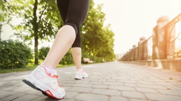 woman walking for exercise | williamson realty