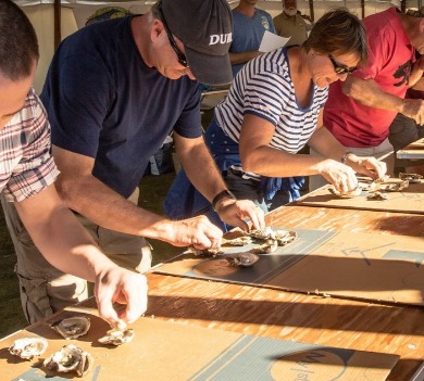 people eating oysters contest | Ocean Isle Beach NC Vacation Rentals | Williamson Realty